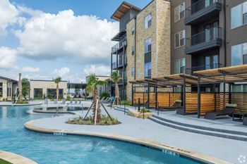 Lazy river, gazebos and expansive deck with bbq grills